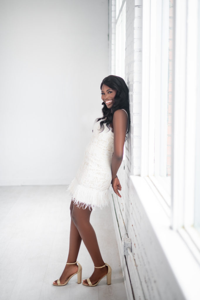 Lumen room Dallas Texas 30th Birthday Photoshoot outfit short white dress upscale classy standing pose