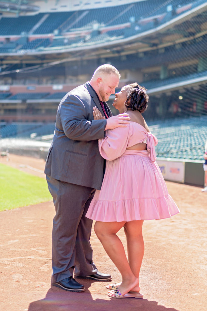 engaged couple at Minute Maid Park Houston