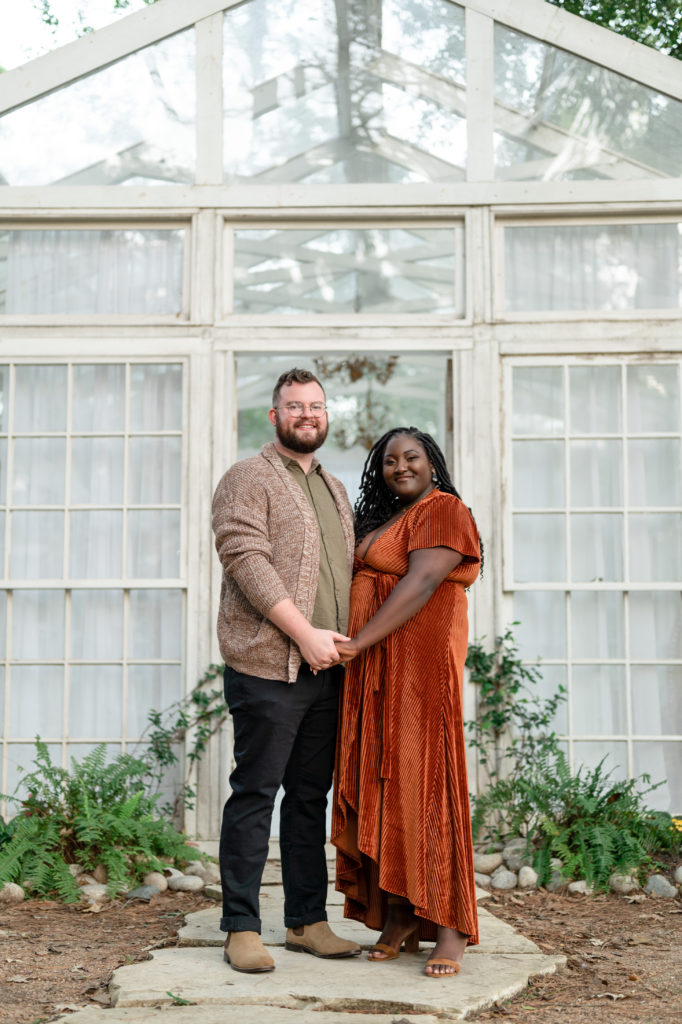 couple pose together during their engagement session 
