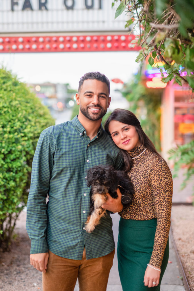 Young couple recently moved to Austin pose in South Congress, Austin, TX w/ their dog. Couple color coordination in Austin, TX
